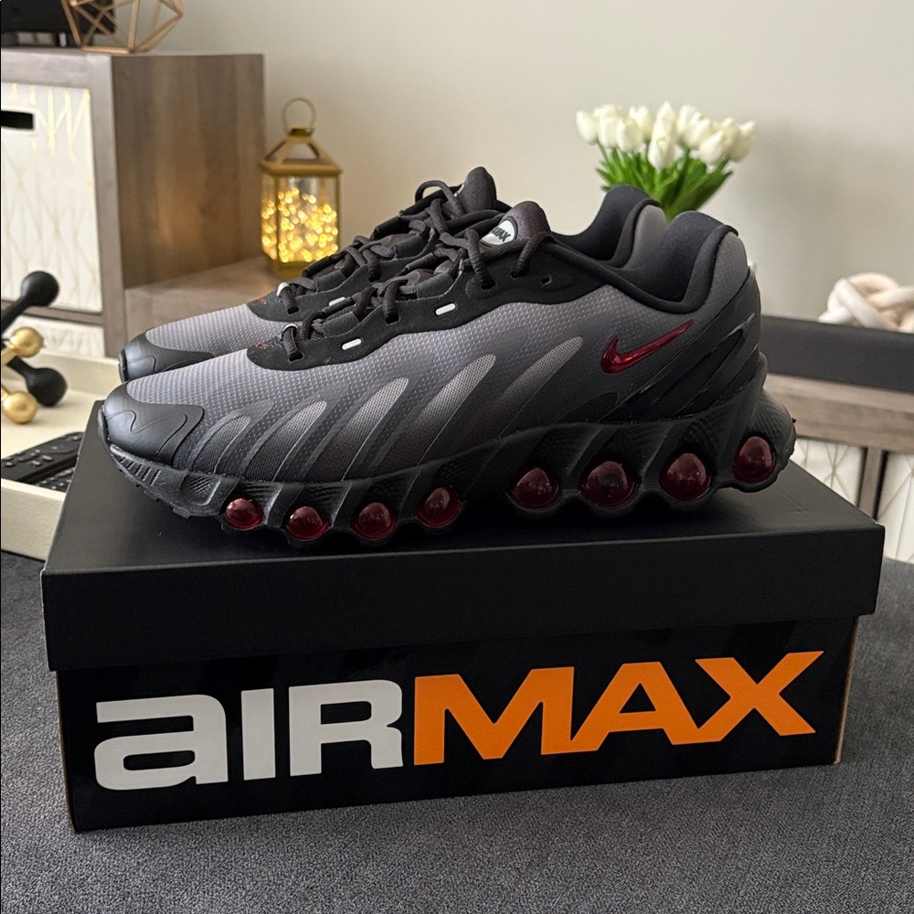 Brand new. Nike Air Max Black with Red Accents size 10 men’s.